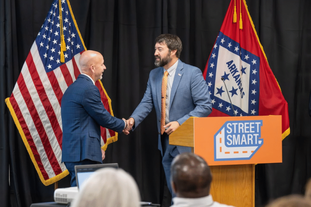 From left, Arkansas Department of Education Director Jacob Oliva and ARDOT Director Jared Wiley introduce Street Smart at an August 15 news conference. The program is designed to promote road safety among students.